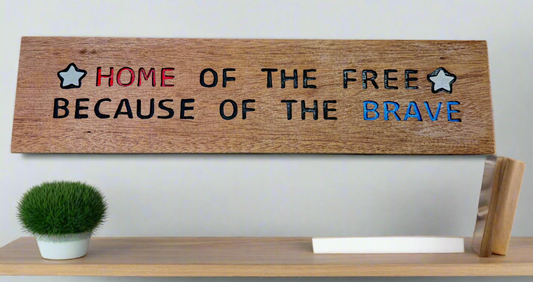 Hand carved sign - Land of the free